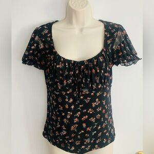 No Boundaries black blouse with red and green flower accents, size M